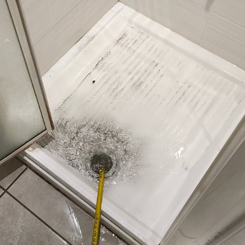 Débouchage haute pression douche